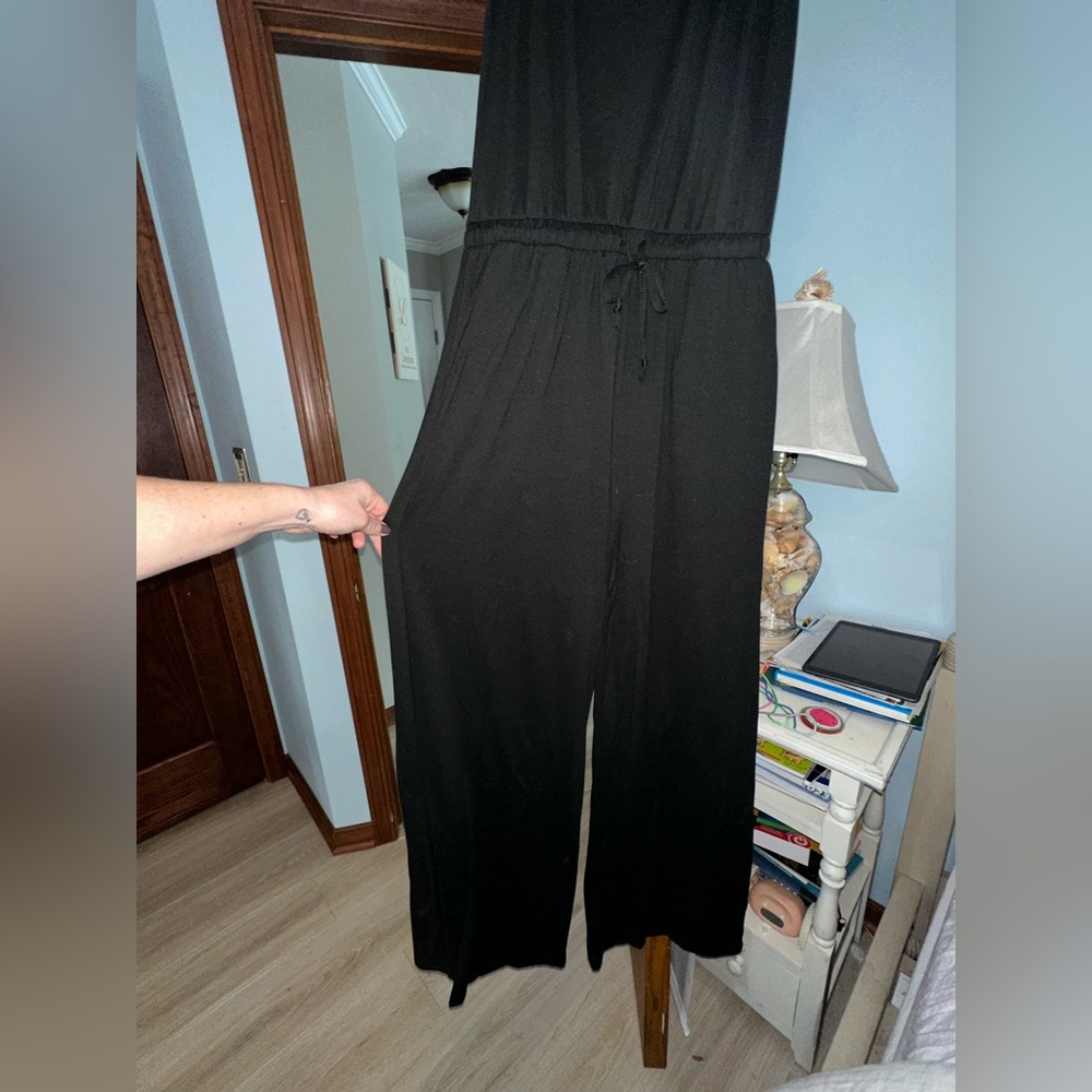 Women’s black size small jumpsuit. Soft sleeveless brand new with tags.